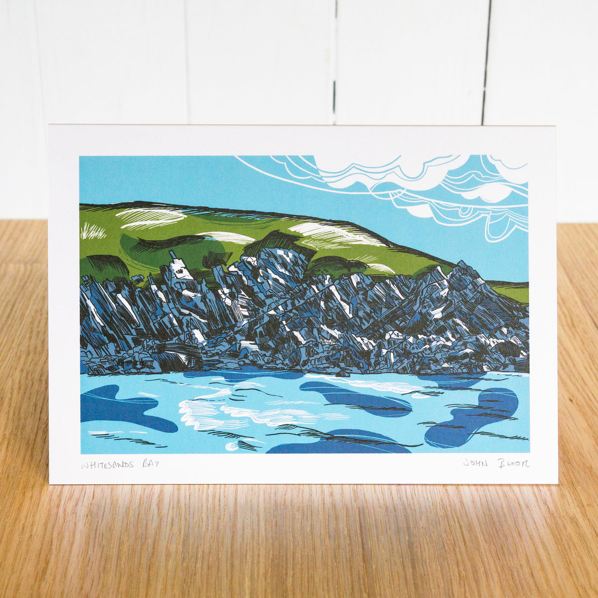 A greetings card depicting Whitesands Bay in Wales.