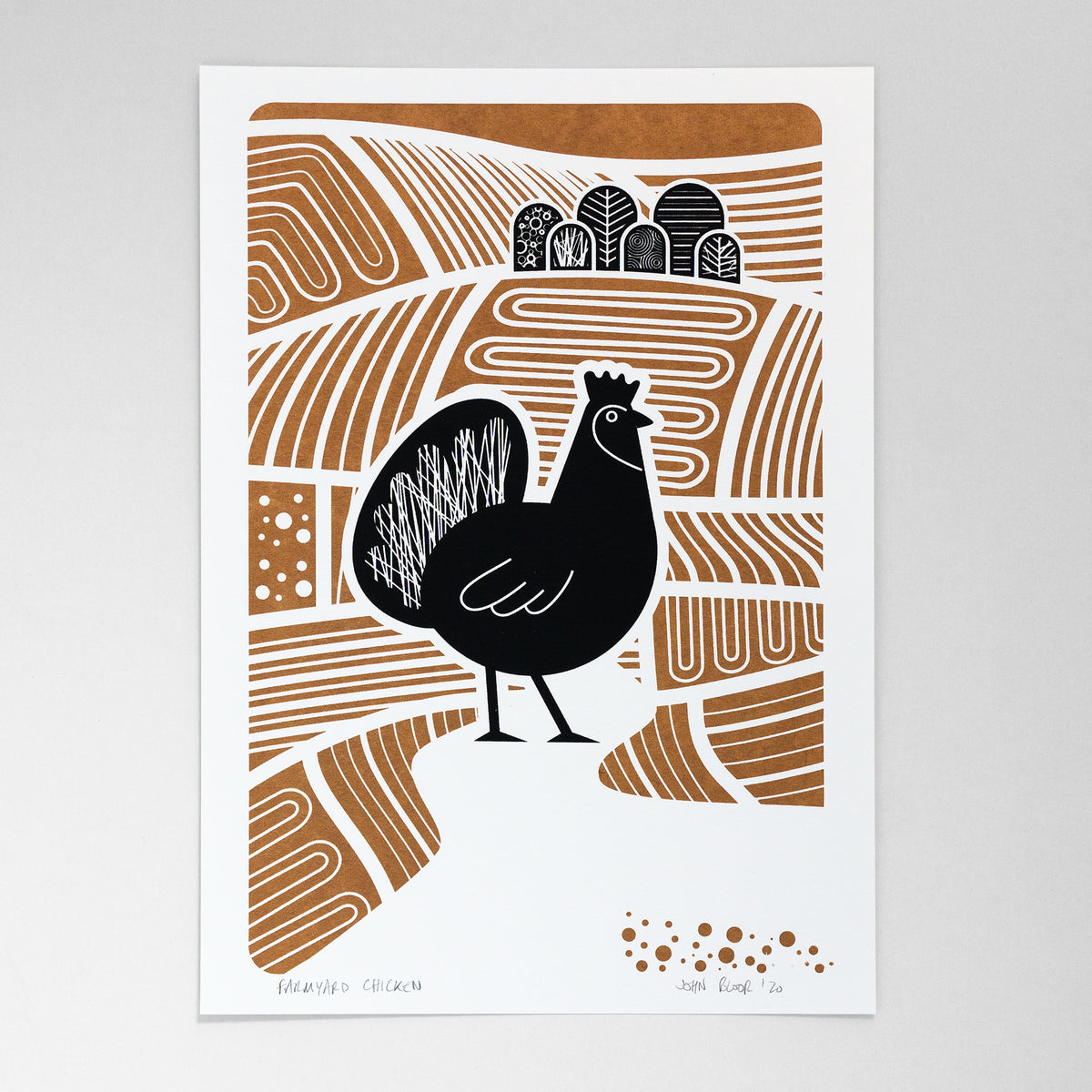 A hand pulled screen print in a geometric design depicting a chicken in black, standing in brown ploughed fields, with black trees behind.