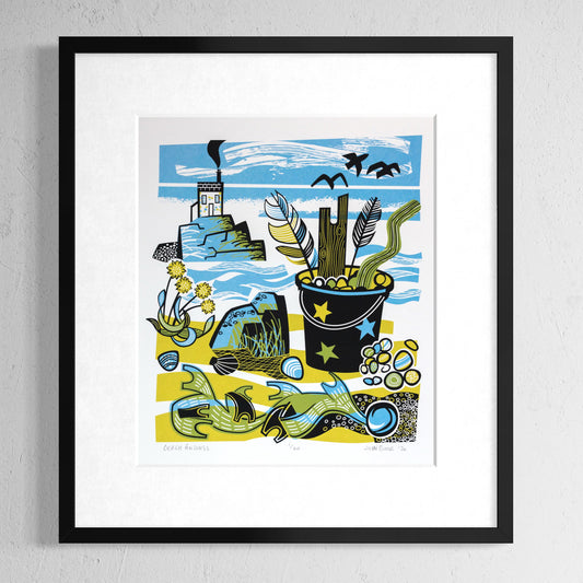 Beach Findings screenprint which depicts things I've found on a beach including a bucket with feathers, driftwood and pebbles. There is seaweed and thrift, a rock with mussels and a house on an outcrop. Inspired by all those holidays to beaches in Cornwall and Wales.