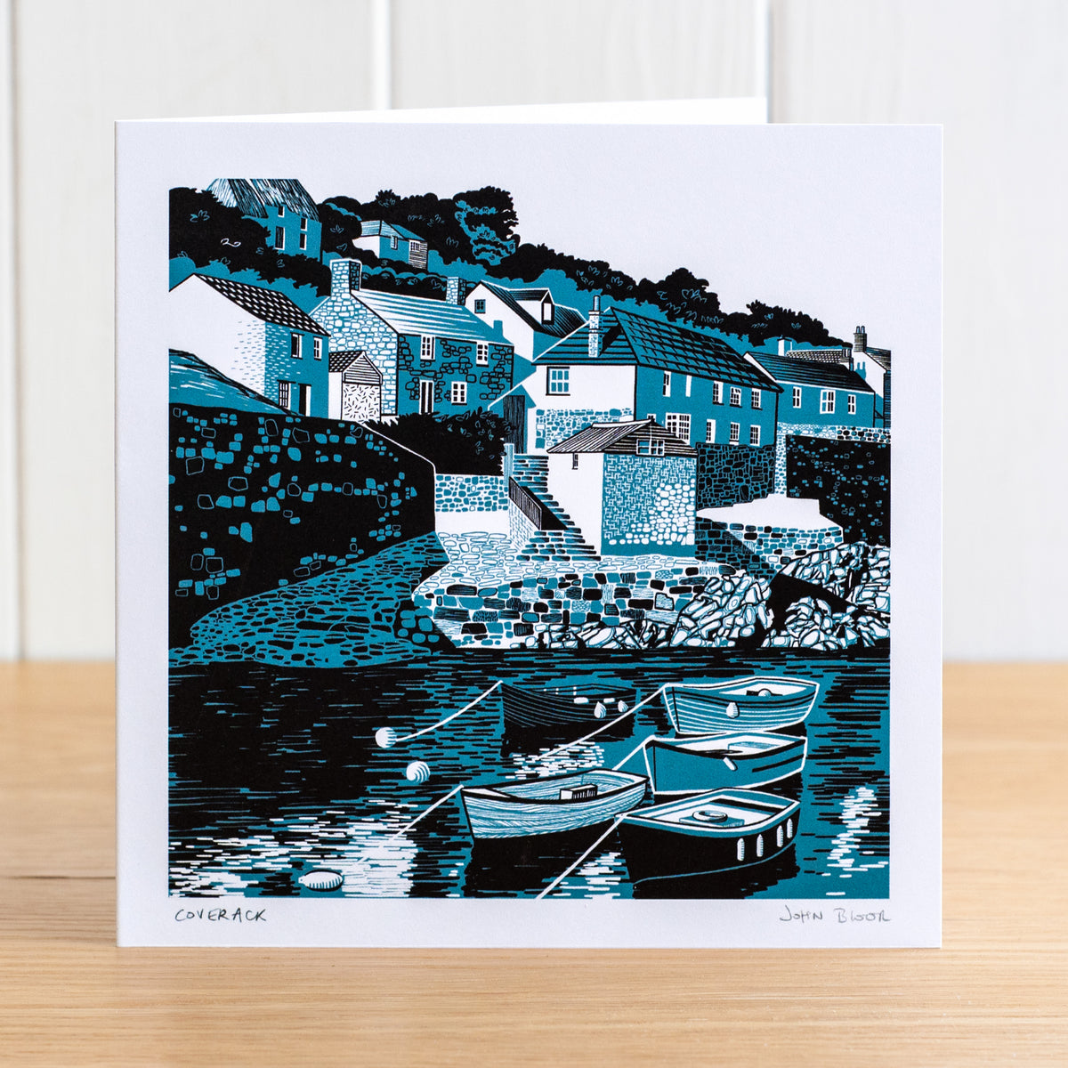 A greetings card depicting Coverack harbour and boats