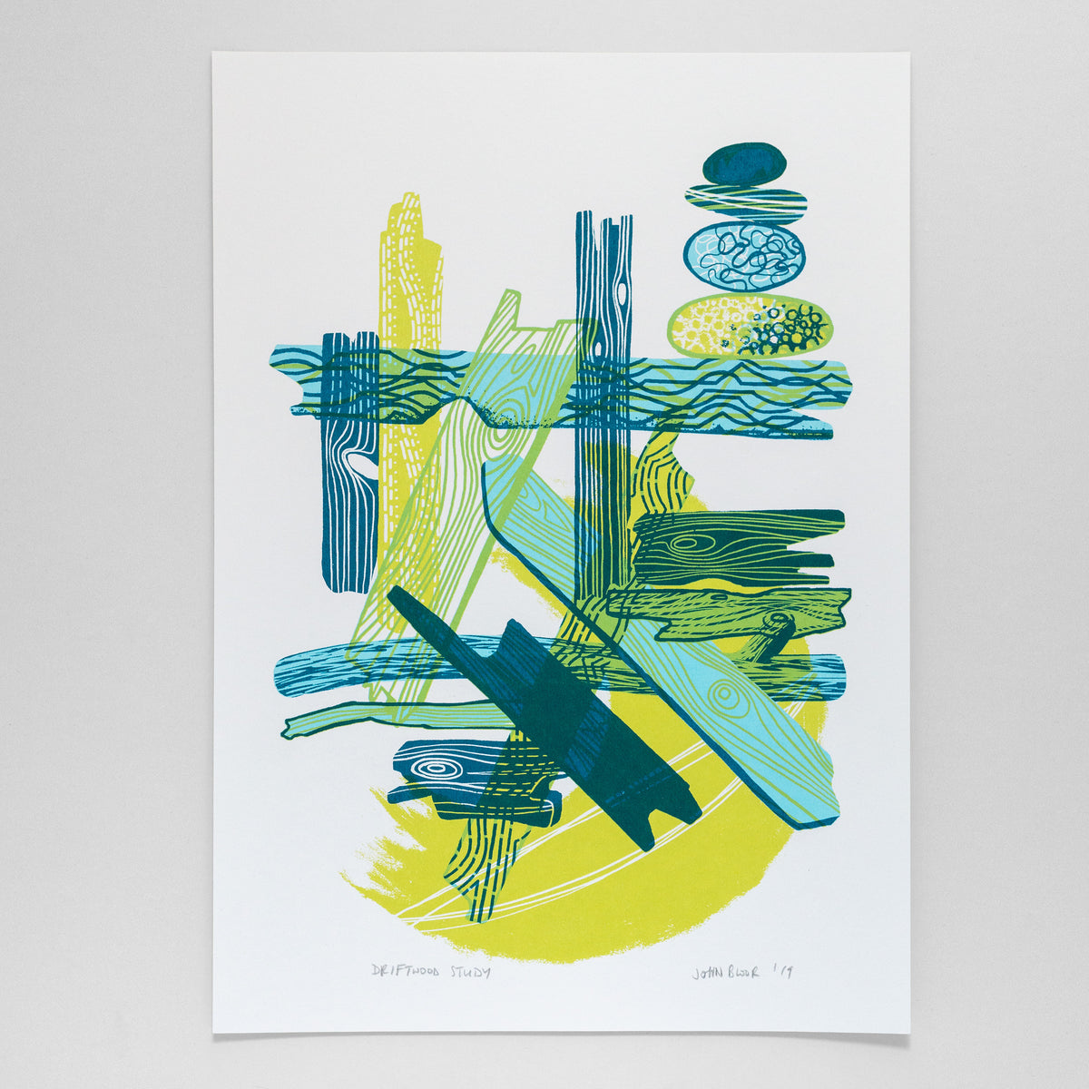 Driftwood Study screenprint. It depicts pieces of driftwood overlapping in an abstract manner and at different angles. Pebbles balance on some of the driftwood pieces. 