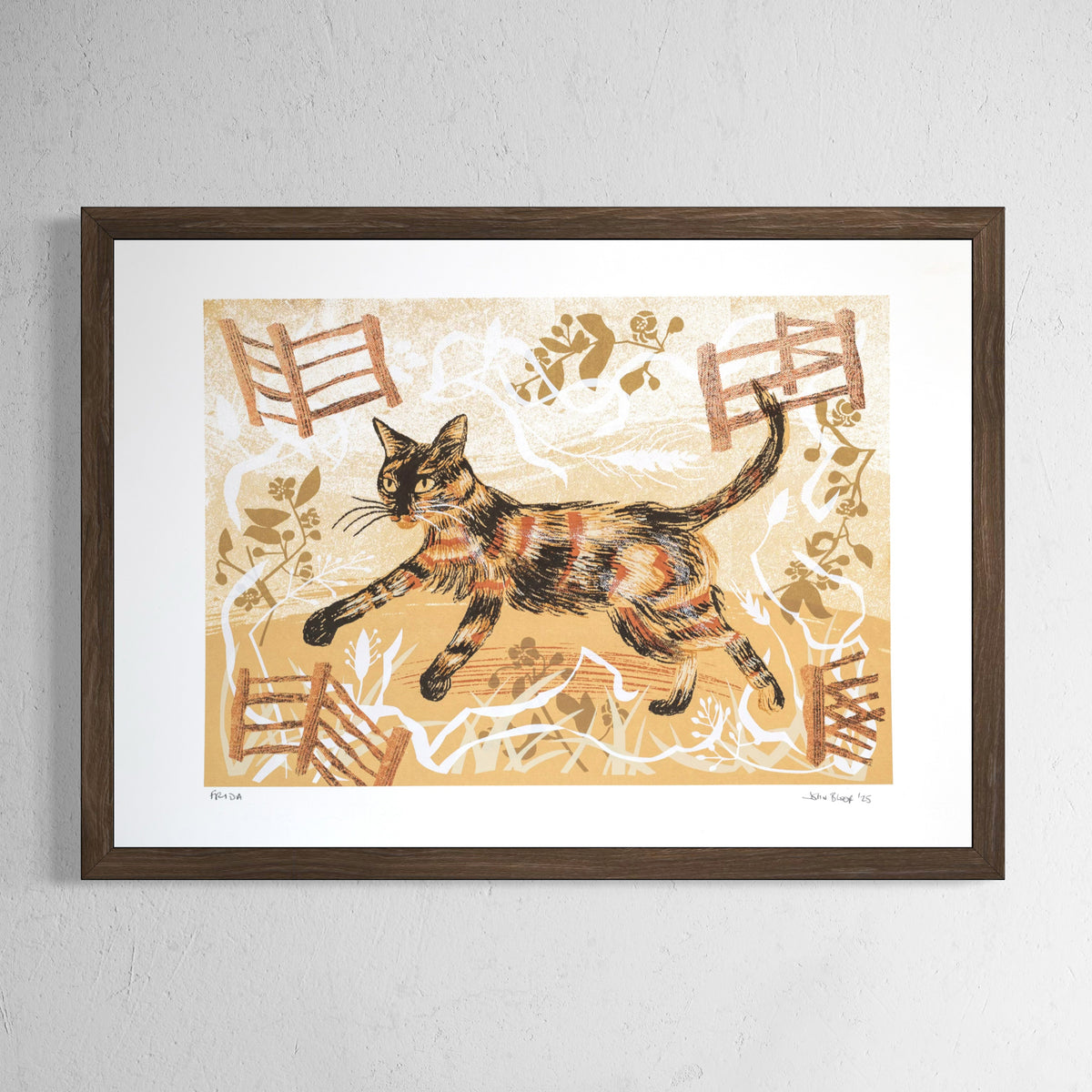 Frida screenprint. It features a cute Tortoiseshell kitten-cat called Frida running between grasses and fences. It's in brown, orange and black.