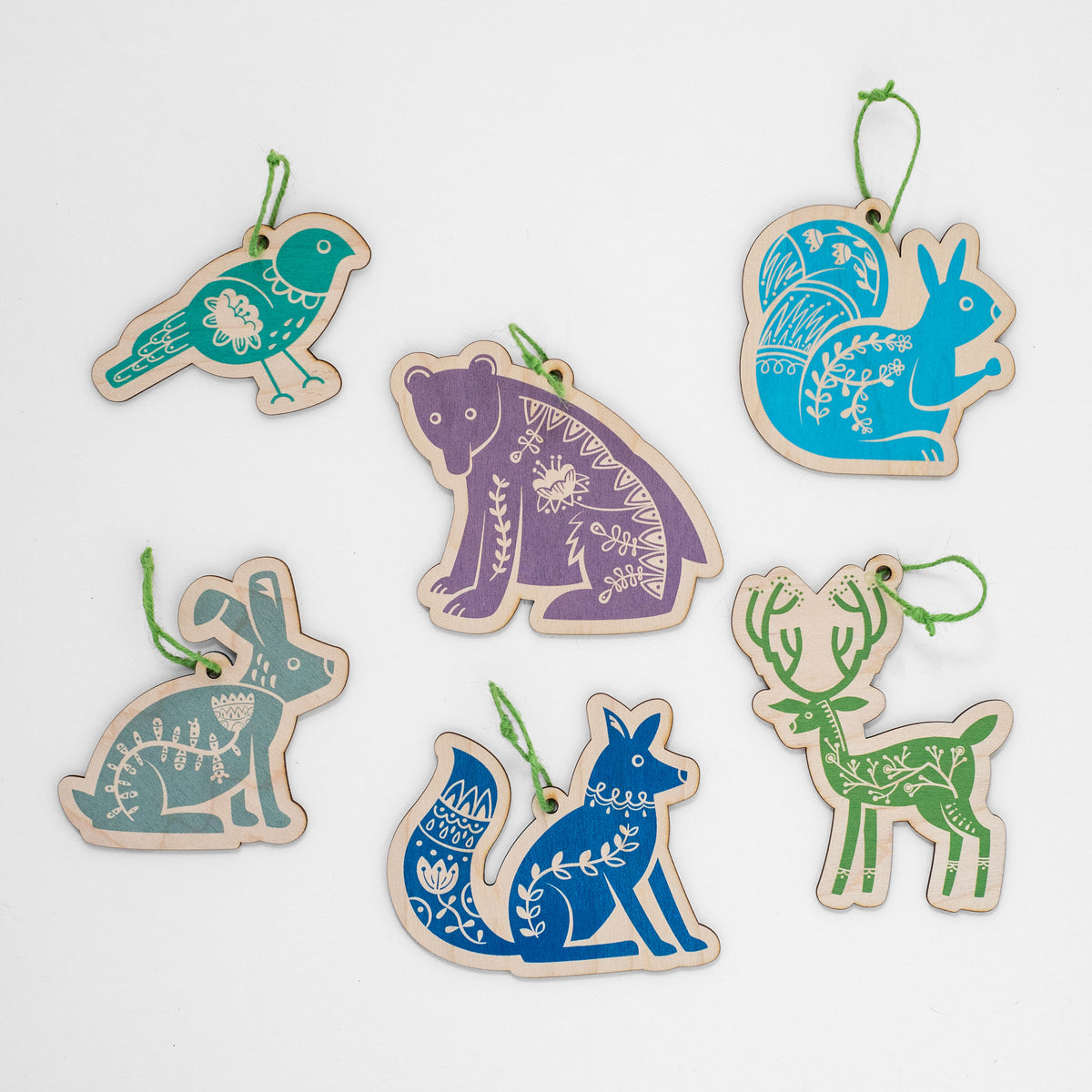 Six Scandi Forest animals hand printed on laser cut wood shapes including a fox, bear, squirrel, hare, stag and bird. In the set you will receive one of each.