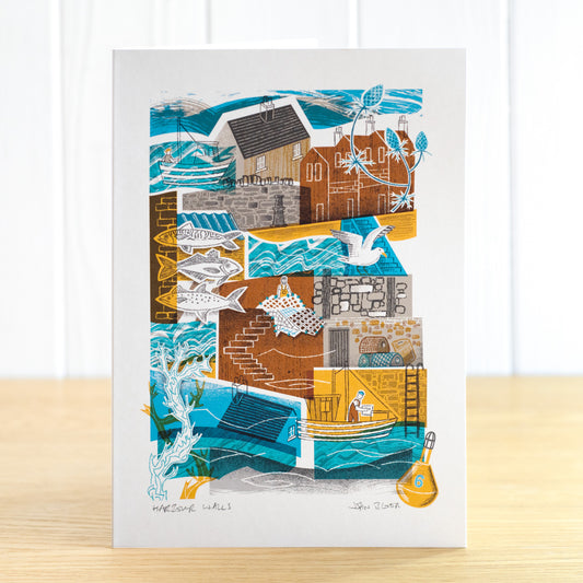 Harbour Walls greetings card. It features boats, fishermen, nets, lobster pots, a buoy, houses, roofs, stone harbour walls, fish, a gull and seaweed.