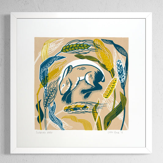 Sleeping Hare screenprint. It depicts a young sleeping hare amongst wheat heads, stalks and leaves in blues and yellows. 