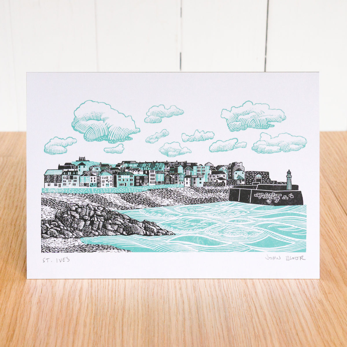 A greetings card depicting St Ives, Cornwall, showing the harbour and houses.