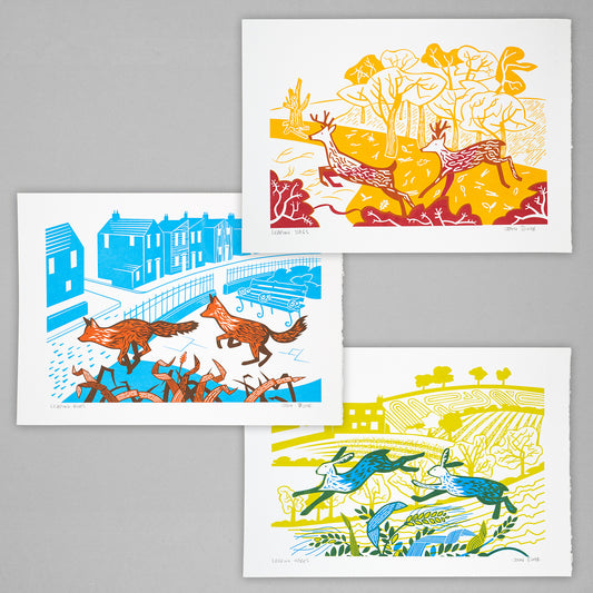 Leaping Animals screenprints. One shows stags leaping, one shows foxes leaping and one shows hares leaping.