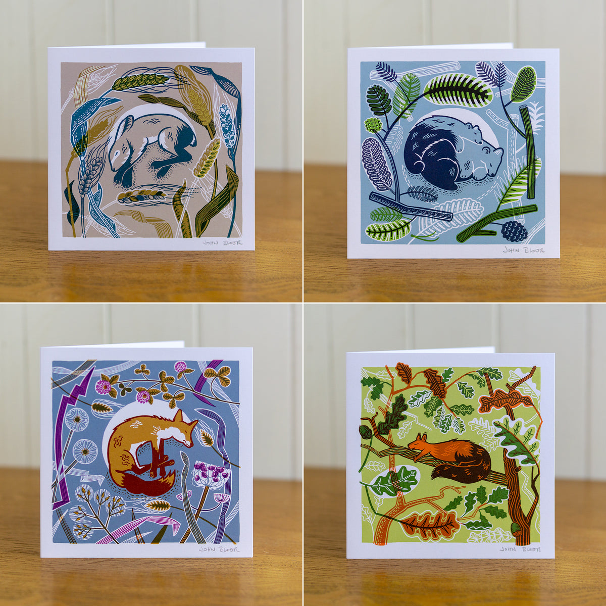 All four Sleeping Animals cards depicting a sleeping hare, bears, fox and squirrel.