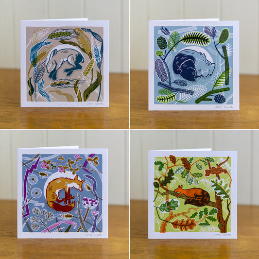 All four Sleeping Animals cards depicting a sleeping hare, bears, fox and squirrel.