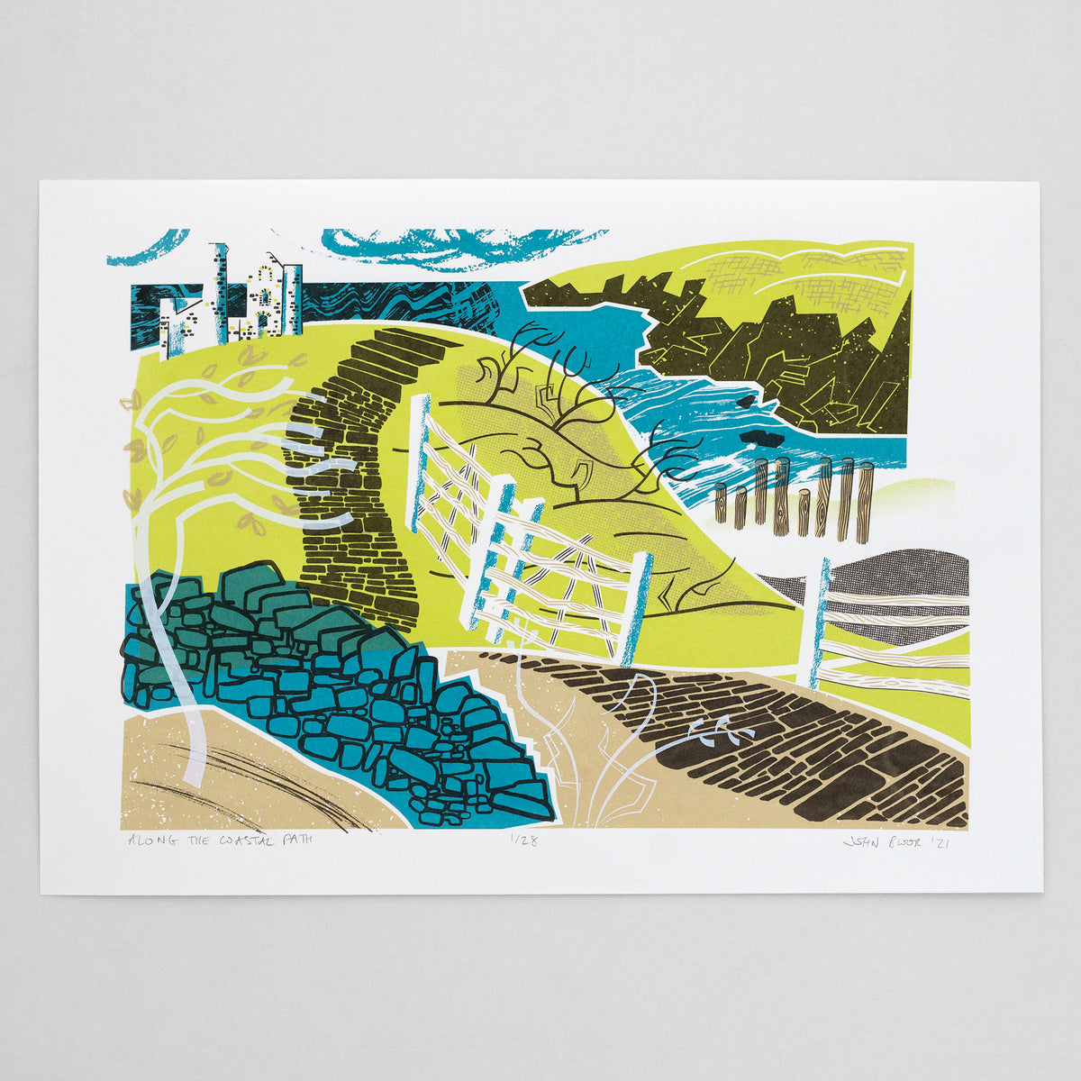 Along the Coastal Path hand pulled screen print featuring a winding coastal path between fences and dry stone walls, leading off towards a headland. There is also a tin mine, tree, bushes and beach. 