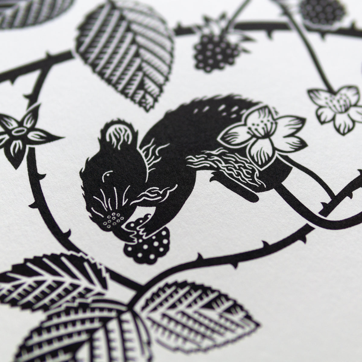Screenprint detail of a mouse eating a bramble.