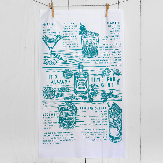 A tea towel screen printed in dark blue green featuring four gin cocktails and illustrations, perfect for the gin lover in your life.