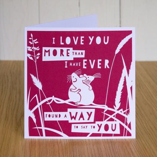 "I love you more than I have ever found a way to say to you" Valentines card depicting two mice hugging amongst grasses. 