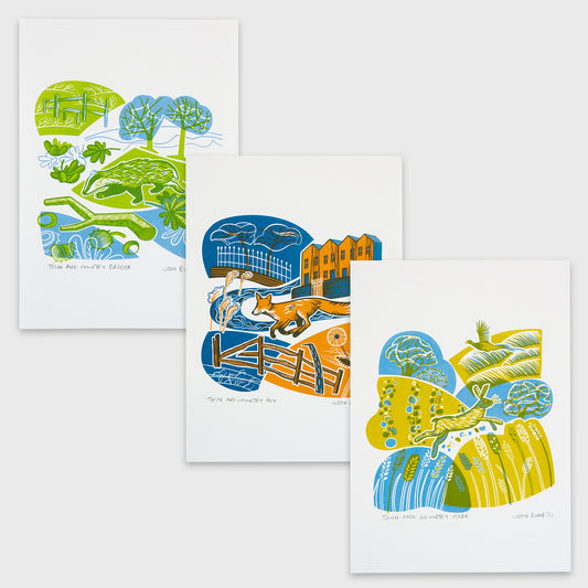 Town and Country screenprints. A badger running between fallen leaves, tree trunks and trees. A fox running between houses and a fence. And a hare running in a field. 